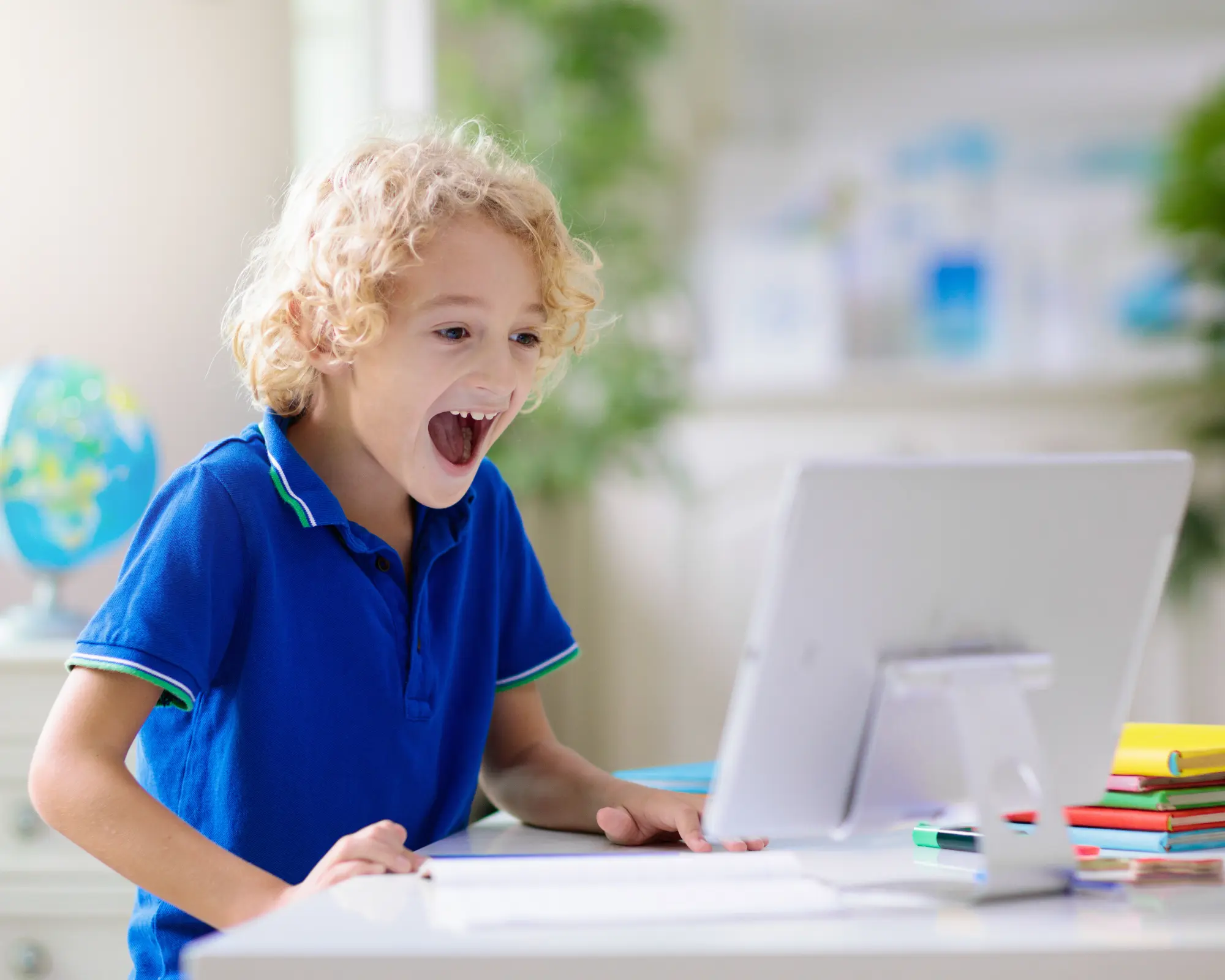 A young student enjoying an exciting online lesson